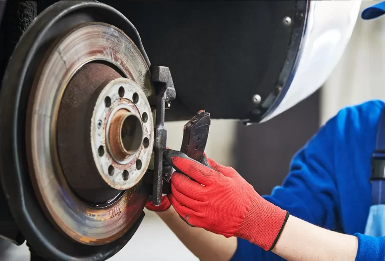 Vehicle brake inspection – checking brake pad thickness and rotors