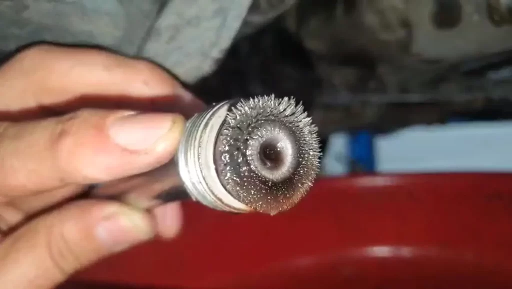Metal particles found in transmission pan — 1994 Nissan Maxima diagnosis