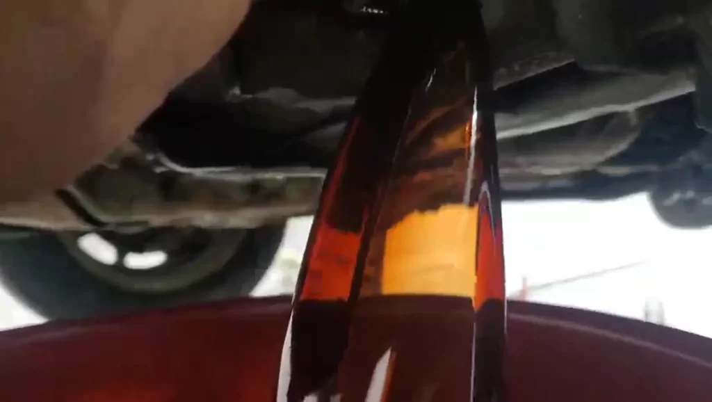 Original transmission fluid from 1994 — severe neglect in Nissan Maxima